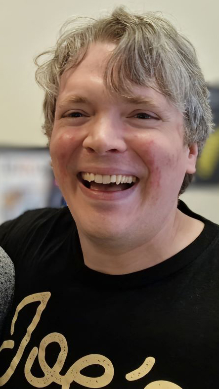 Smiling headshot of Daniel Brown.