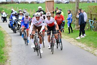 WAREGEM BELGIUM MARCH 30 LR Greg Van Avermaet of Belgium and AG2R Citren Team Bryan Coquard of France and Team Cofidis and Jan Tratnik of Slovenia and Team Bahrain Victorious compete during the 76th Dwars Door Vlaanderen 2022 Mens Elite a 1837km one day race from Roeselare to Waregem DDV22 DDVmen WorldTour on March 30 2022 in Waregem Belgium Photo by Peter De Voecht PoolGetty Images