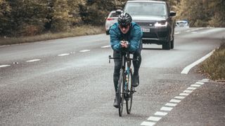 Darren cycles one of his 10 Ironman-distance triathlons