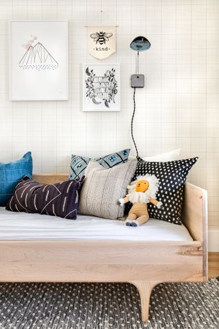 A bedroom with wall art