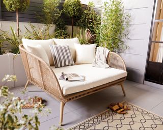 rope effect outdoor snug seat from Aldi with beige cushions