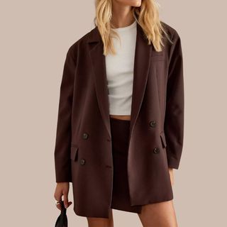 Image of woman wearing brown blazer