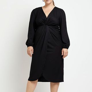 model wearing river island black midi dress