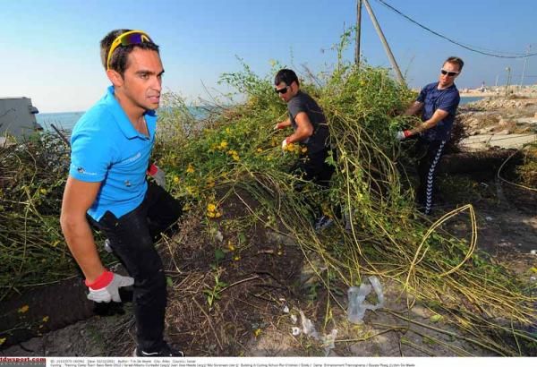 Contador and his teammates clear the site before the building is started