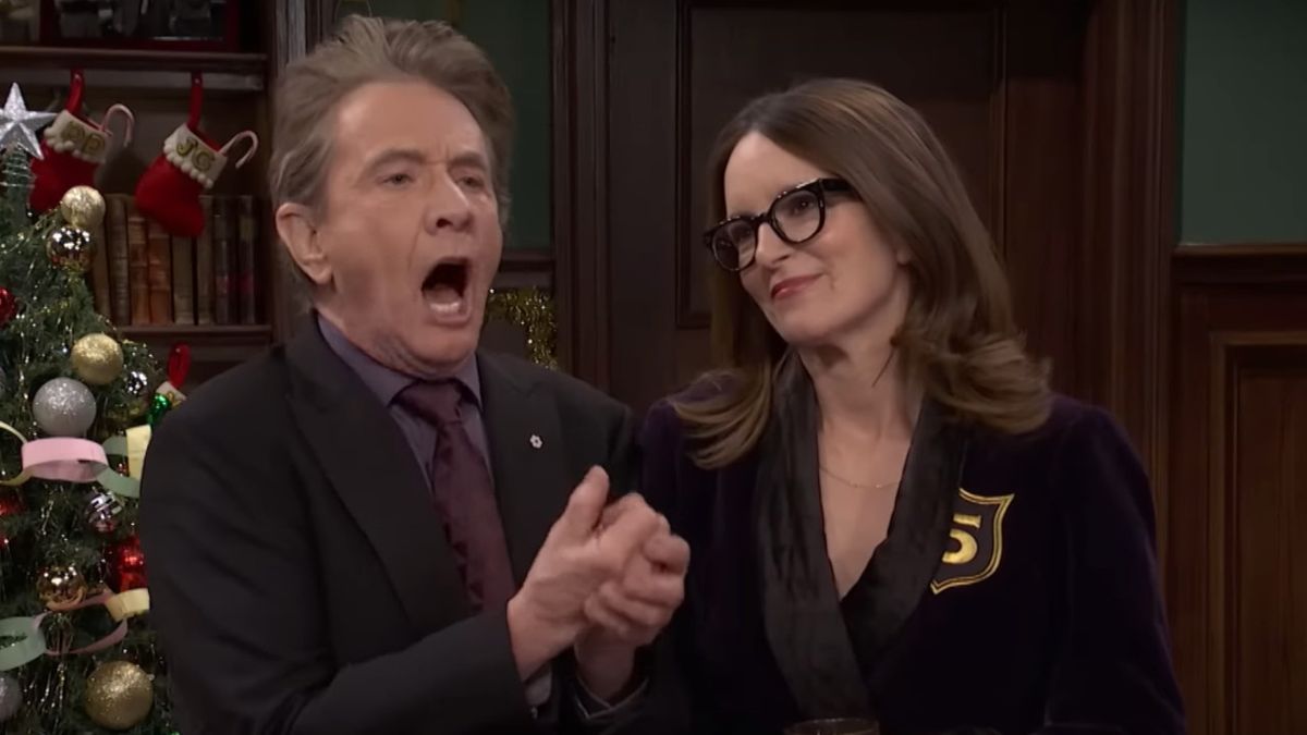 Martin Short lets out a surprised yell next to Tina Fey on Saturday Night Live.