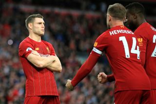 James Milner, left, celebrates a successful penalty against Leicester