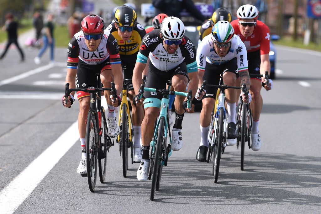 WEVELGEM BELGIUM MARCH 28 Sonny Colbrelli of Italy and Team Bahrain Victorious Wout Van Aert of Belgium Nathan Van Hooydonck of Belgium and Team Jumbo Visma Giacomo Nizzolo of Italy and Team Qhubeka Assos Matteo Trentin of Italy and UAE Team Emirates Michael Matthews of Australia and Team Team BikeExchange Stefan Kung of Switzerland and Team Groupama FDJ during the 83rd GentWevelgem in Flanders Fields 2021 Mens Elite a 254km race from Ypres to Wevelgem GWE21 GWEmen FlandersClassic on March 28 2021 in Wevelgem Belgium Photo by Tim de WaeleGetty Images