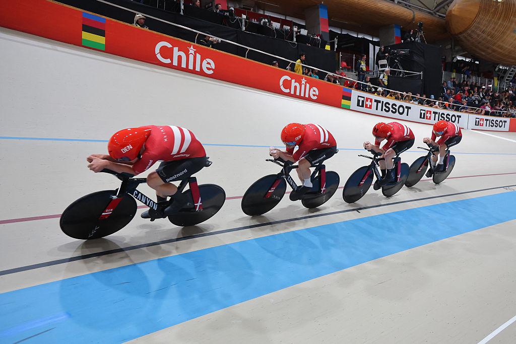 Denmark's Tobias Hansen, Niklas Larsen, Frederik Madsen and Rasmus Pedersen compete in the men's team pursuit final event of the 2025 UCI Track World Championships