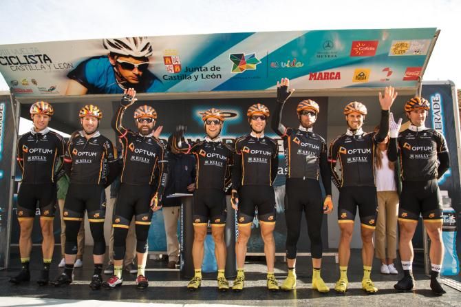 The team waves to the crowd at the stage 2 sign-in at the Vuelta a Castilla y Leon