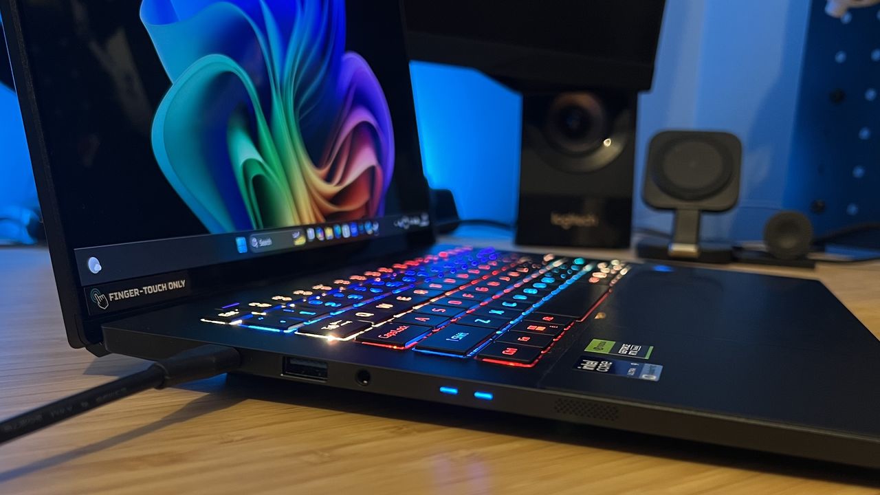 Left side of Acer Predator Triton 14 AI showing ports and thickness of the main chassis