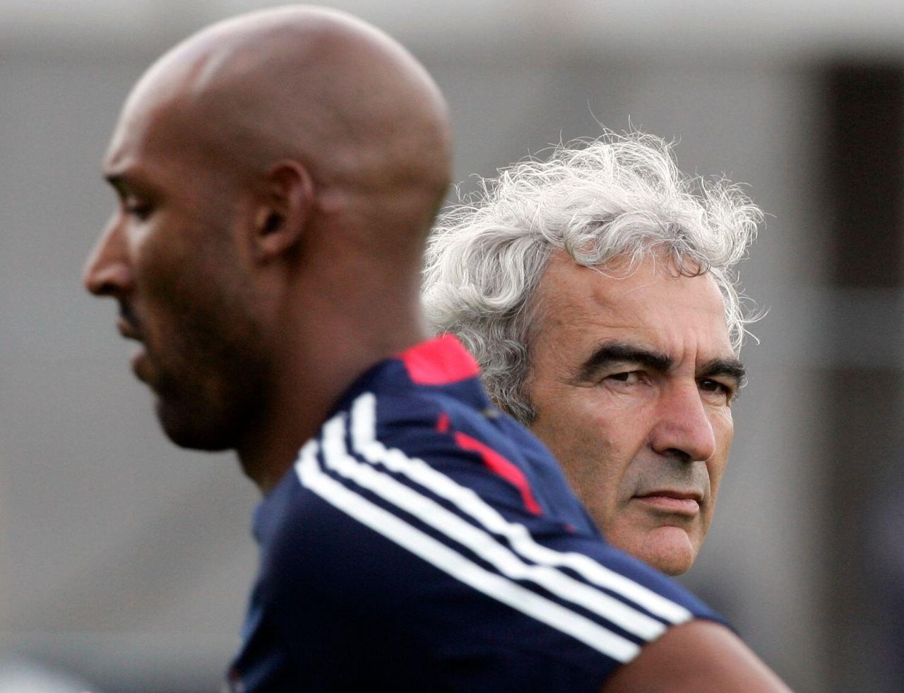 France's Nicolas Anelka and manager Raymond Domenech during a training session at the 2010 World Cup in South Africa