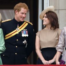 Prince Harry and Princess Eugenie stand on the balcony of Buckingham Palace during Trooping the Colour on June 13, 2015 in London, England. The ceremony is Queen Elizabeth II's annual birthday parade and dates back to the time of Charles II in the 17th Century, when the Colours of a regiment were used as a rallying point in battle.