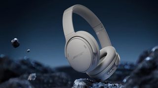 Bose QuietComfort Headphones (2nd Gen) in cream / white campaign poster image