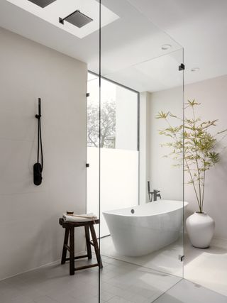 bathroom with grey walls and indoor tree