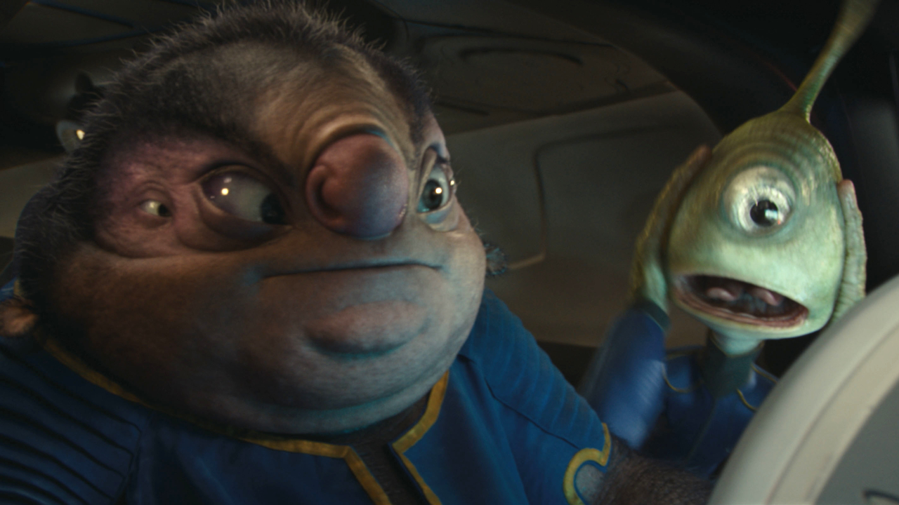 Jumba and Pleakley study a display with concern in Lilo and Stitch.
