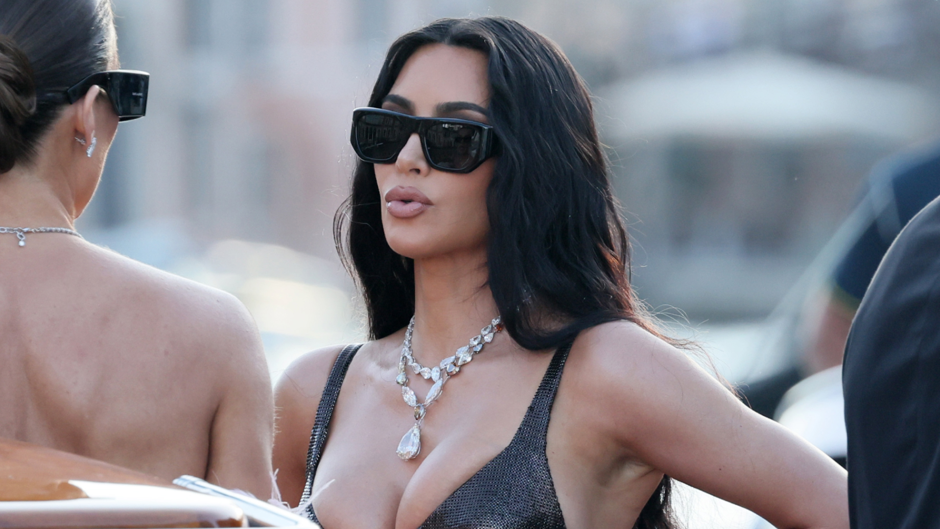 Kim Kardashian wearing a vintage Versace gown made from chainmail and lace in Venice