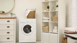Laundry room with cabinets