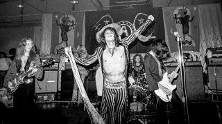 Aerosmith performing onstage in 1973