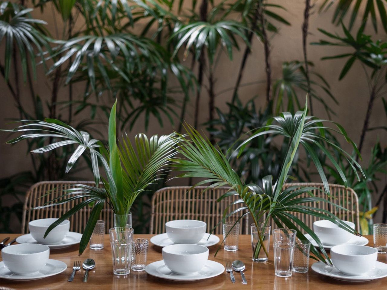 Leafy Floral Arrangements On An Outdoor Table