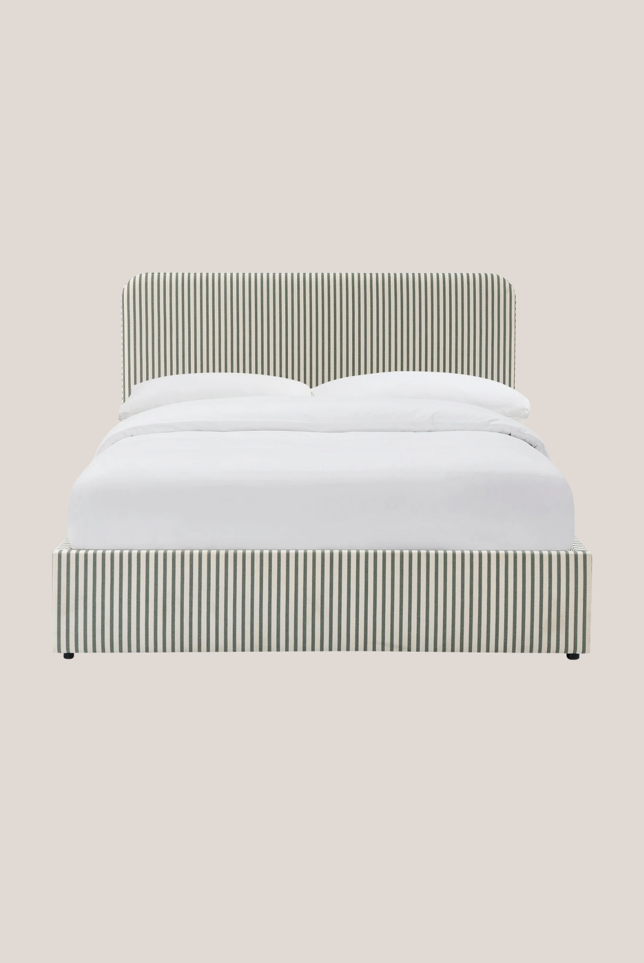 A striped ottoman bed with built in headboard