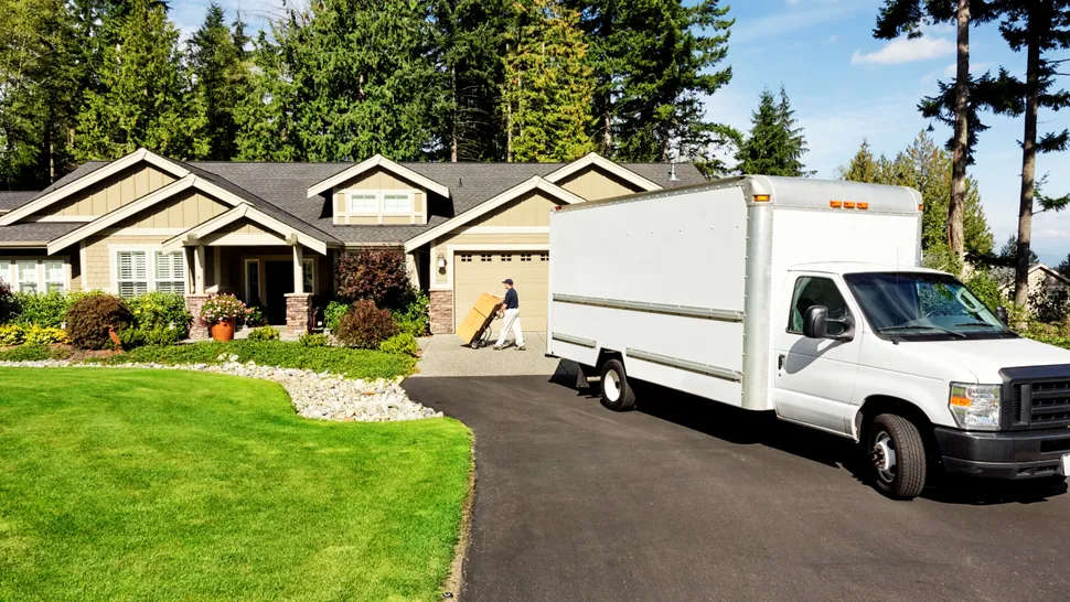 moving truck in front of house