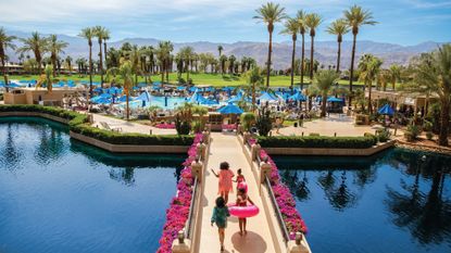 Four women head to the pool at JW Marriott Desert Springs Resort & Spa