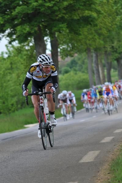 The peloton bearing down on Thomas De Gendt (Topsport Vlaanderen - Mercator)