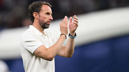 Gareth Southgate claps his team and England fans after the national squad was defeated by Spain at Euros 2024