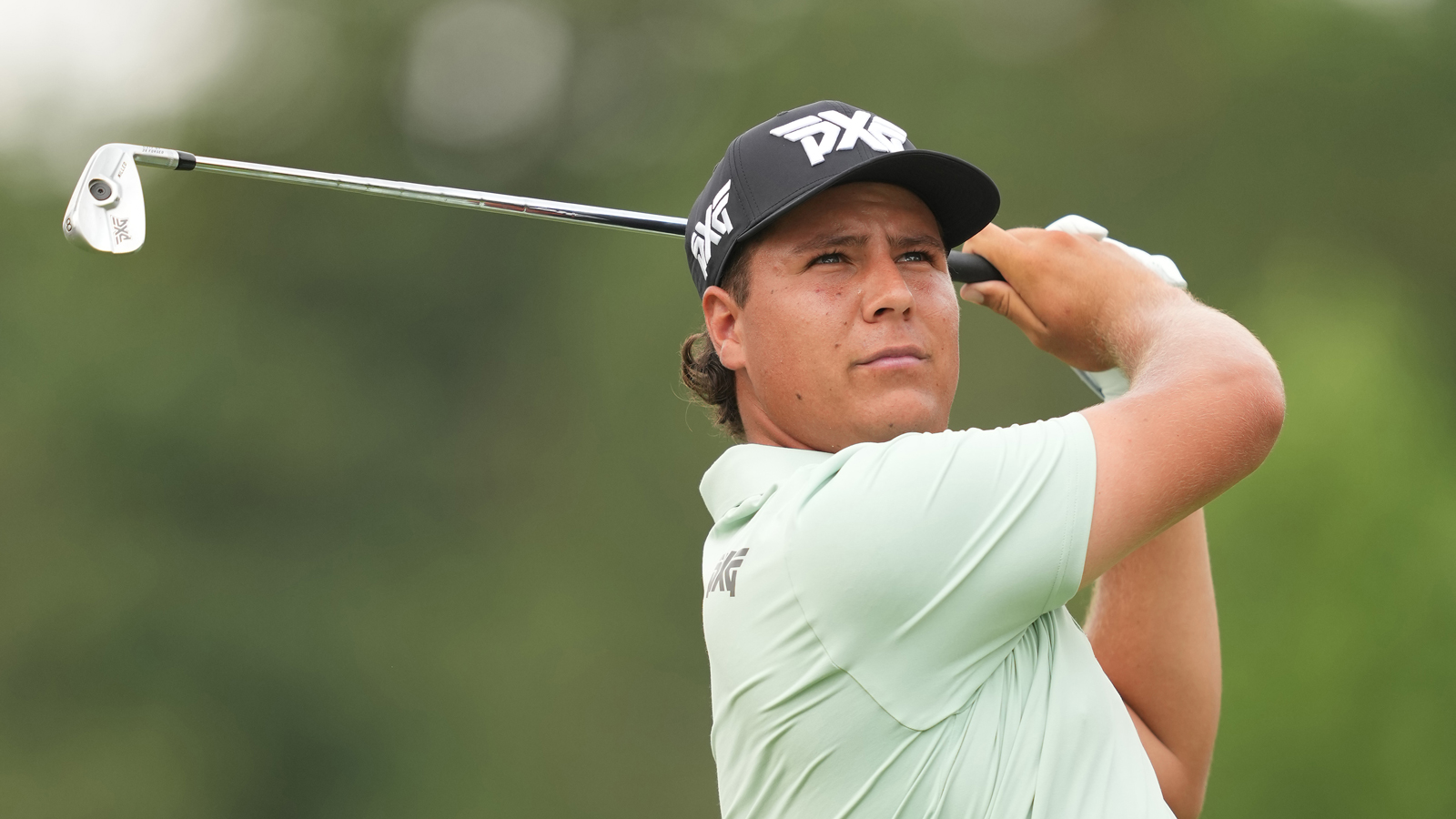 Aldrich Potgieter hits an iron shot