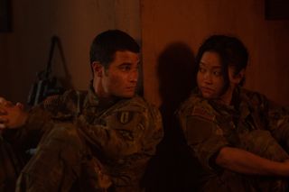 chase stokes and lana condor as soldiers in camo uniforms in the movie valiant one