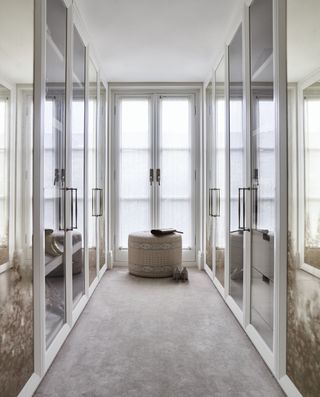 walk in closet wardrobe with glass doors, light and airy