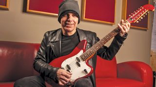 Joe Satriani poses with his 1966 Fender Electric XII 12-string guitar in 2020 (circa February/March)
