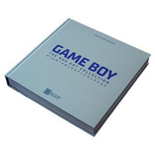 Best game art book; a grey book cover with blue metallic wording