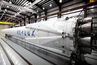 A close-up look at the landing legs on a private SpaceX Falcon 9 rocket launching from Cape Canaveral Air Force Station, Fla., on April 14, 2014. The Falcon 9 rocket will launch a Dragon cargo ship to the International Space Station, then attempt to return its first stage to Earth in a reusable rocket technology demonstration.