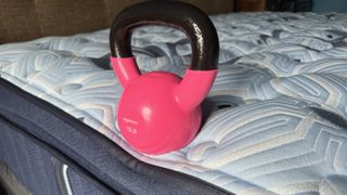 Testing the edge support of the Stearns & Foster Estate using a 15 pound kettlebell