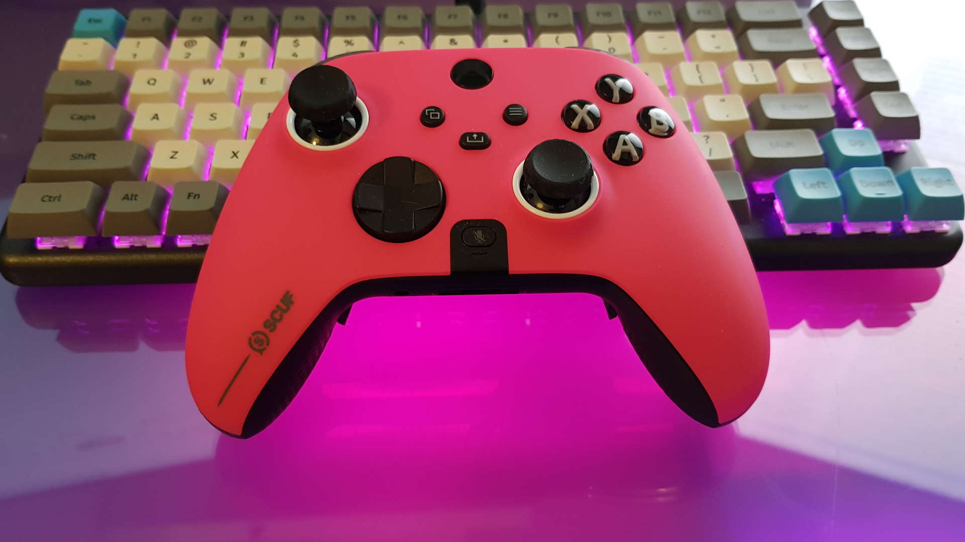 Scuf Instinct Pro controller in front of a System 76 Launch keyboard