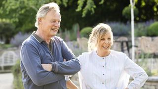Martin Clunes in a dark shirt and Mel Giedroyc in a light top in Mel Giedroyc and Martin Clunes Explore Britain by the Book.