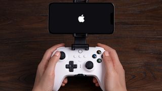 8BitDo Ultimate controller used with an iPhone