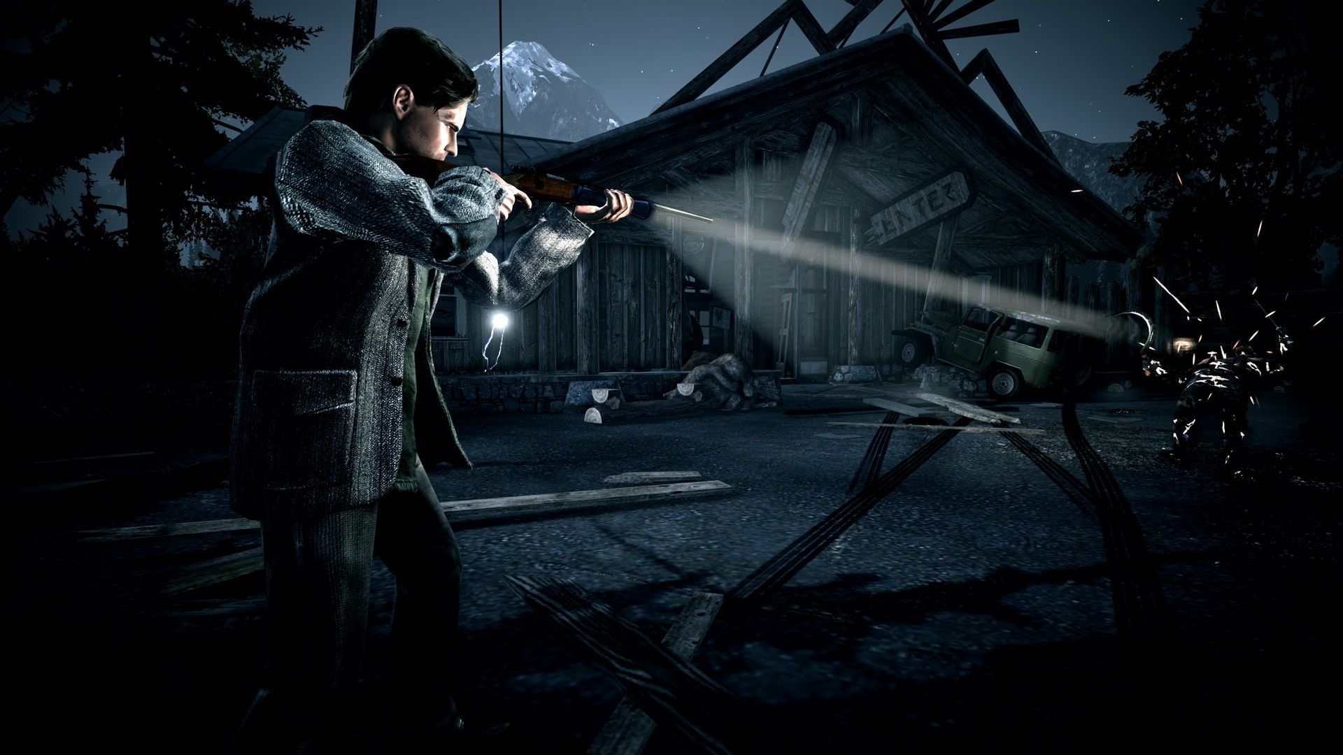 Alan Wake gameplay screenshot with protagonist firing a shotgun into the darkness