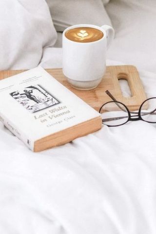 OTTY Supima Cotton Duvet Cover & Pillow Case Set on bed with book, coffee and glasses