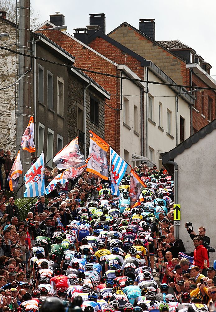 The peloton climb through the town of Houffalize during the 101st Liege-Bastogne-Liege