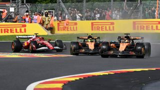 Oscar Piastri of Australia driving the (81) McLaren MCL39 Mercedes leads Lando Norris of Great Britain driving the (4) McLaren MCL39 Mercedes and Charles Leclerc of Monaco driving the (16) Scuderia Ferrari SF-25 on track during the F1 Grand Prix of Belgium at Circuit de Spa-Francorchamps on July 27, 2025 in Spa, Belgium.
