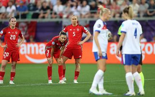 Carrie Jones, Gemma Evans and Rhiannon Roberts of Wales react as the VAR review a potential penalty for England, before subsequently awarding one during the UEFA Women's EURO 2025 Group D match between England and Wales at Arena St. Gallen on July 13, 2025 in St Gallen, Switzerland.