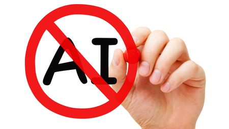 A man's draws a red circle with a slash over the initials AI.