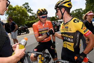 Rohan Dennis and Jumbo-Visma teammate Milan Vader after pursuit of ochre ended for the team on stage 3 of the 2023 Santos Tour Down Under 2023