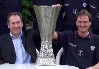 Houllier, left, guided Liverpool to a League Cup, FA Cup and UEFA Cup treble in 2001
