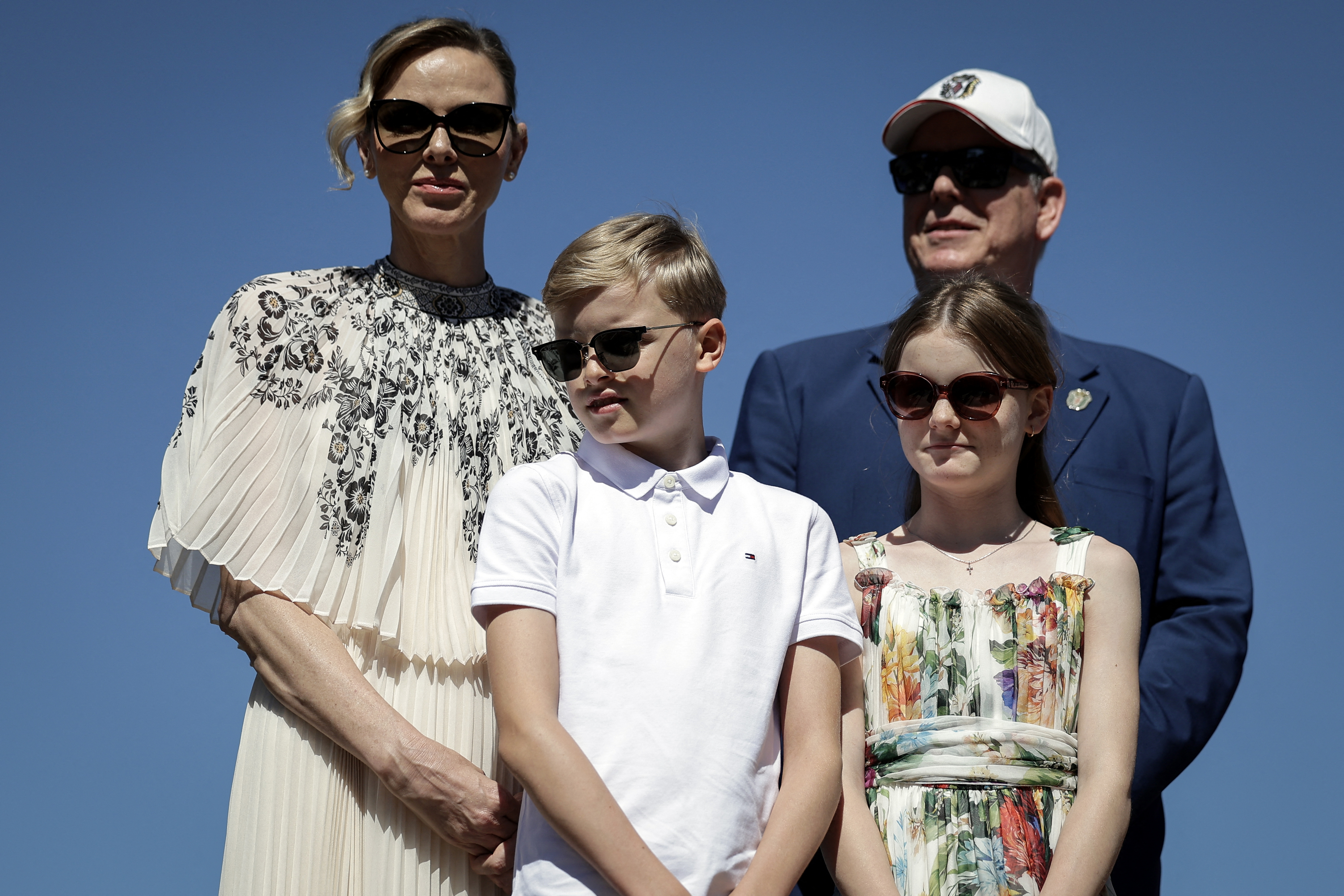 Princess Charlene, Prince Jacques, Princess Gabriella and Prince Albert wearing sunglasses