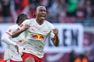 Leipzig's Ivorian forward #49 Yan Diomande celebrates after scoring the 1-1 goal during the Bundesliga football match between RB Leipzig and Augsburg in Leipzig, eastern Germany, on March 7, 2026.