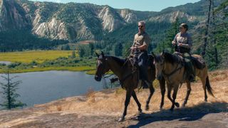 Kyle Turner (Eric Bana) and Naya Vasquez (Lily Santiago) on horseback riding through Yosemite landscape in Netflix's "Untamed"