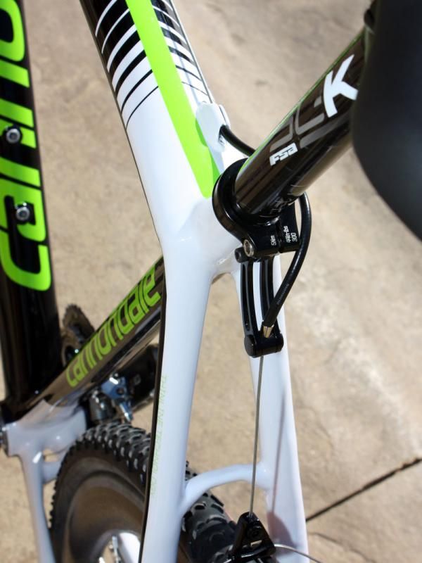 The rear brake housing stop is integrated into the seatpost collar.